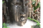 Fontaine bouddha visage zoom